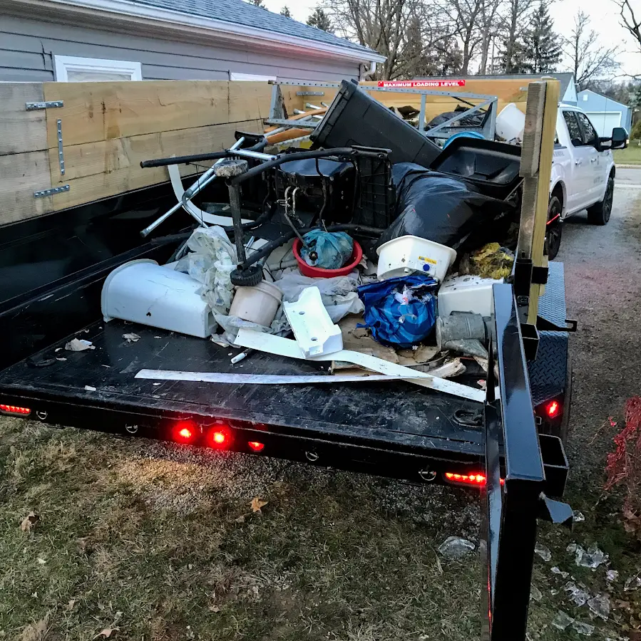 Roll-off dumpster delivered to a residential driveway in Cumberland