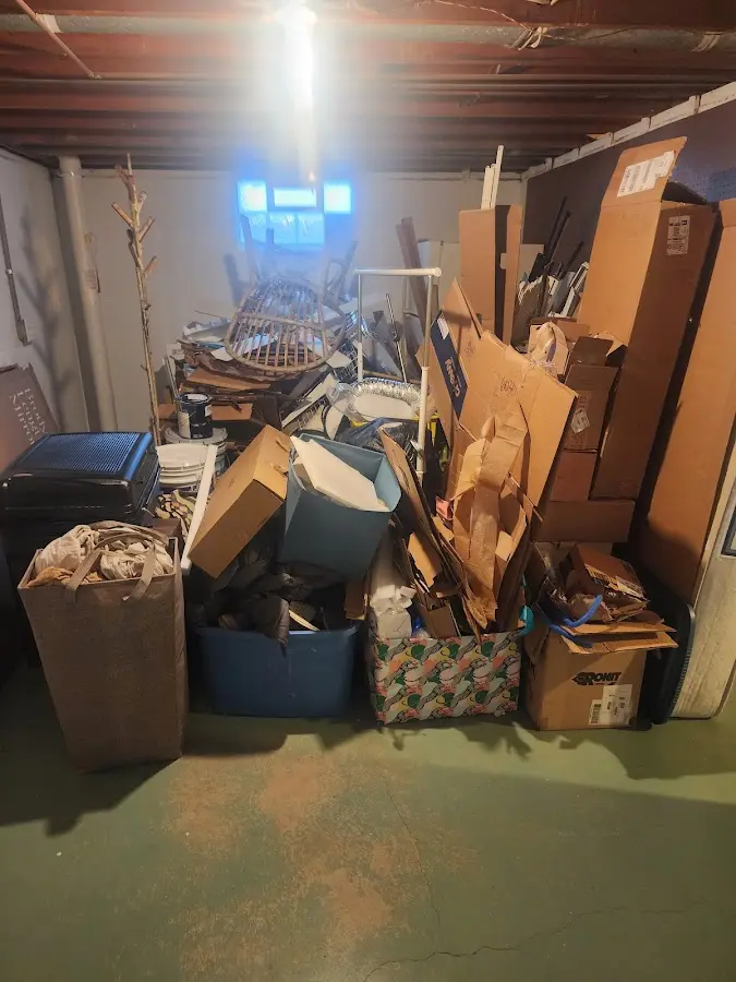 Roll-off dumpster container at job site for 8 Yard Dumpster Rental in Cumberland